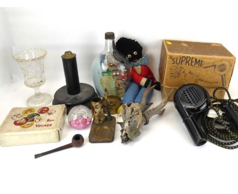 Various mixed collectibles to include a vintage spelter ashtray with dog wearing eyepatch, next to a lamppost, a ship in a bo