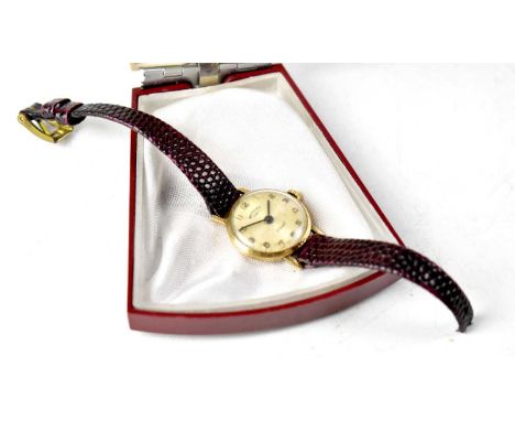 ROTARY; a 9ct gold ladies' wristwatch, the silvered dial set with baton numerals, seventeen jewel movement, case stamped '9 3