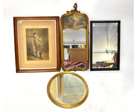 A French-style gilt framed wall mirror surmounted by a print of a couple feeding each other grapes, together with a modern ov