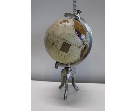 A world globe on a metal base 