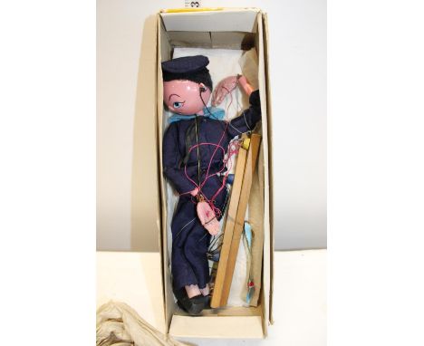 A boxed Pelham puppet 