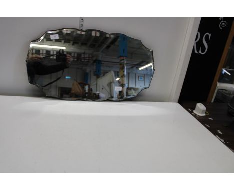 A vintage 1930s mirror. Postage unavailable 