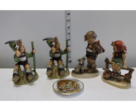 Four vintage goebel figures 