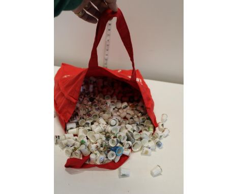 A large collection of ceramic thimbles postage unavailable 