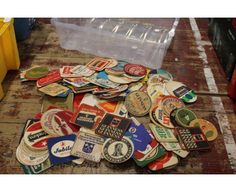 A large job lot of vintage beer mats 