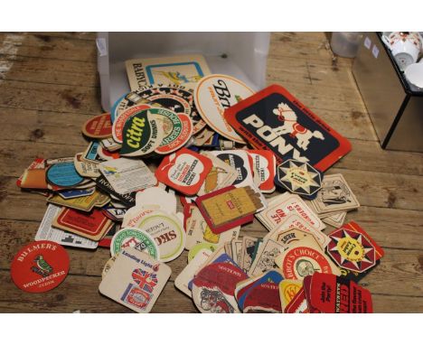 A large job lot of vintage beer mats 