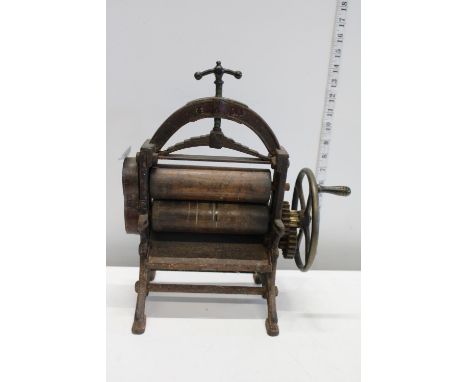 A very heavy model of a vintage mangle 