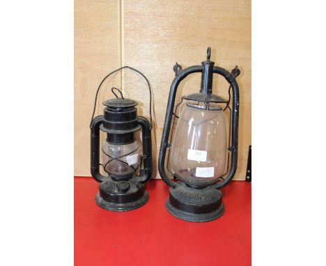 Two vintage oil lamps. Postage unavailable 
