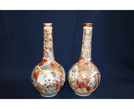 A pair of Chinese ceramic vases with character marks to the base 