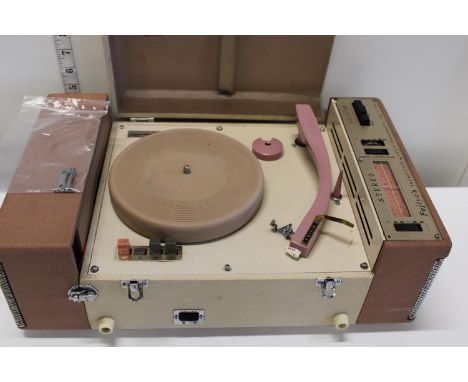 A vintage fujiya's transistor radio and photograph 