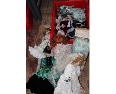 A box of vintage dolls 