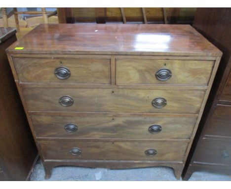 A late George III mahogany flat fronted chest of two short and three long graduated drawers on splayed bracket feet, handles 