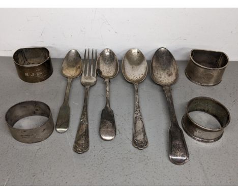 Silver comprising four napkin rings, spoons and fork 287.7g Location: 