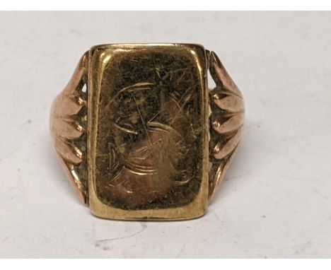 A 9ct gold Gents Signet ring. 4.8gLocation: 