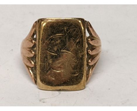 A 9ct gold Gents Signet ring. 4.8gLocation: 