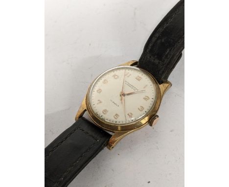 A mid 20th century 9ct gold Gents mid size Winegartens London manual wind wristwatch.Location: 