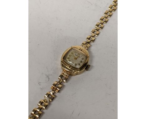 A 9ct gold ladies Rotary manual-wind wristwatch on a 9ct gold bracelet, 11.6g Location: 