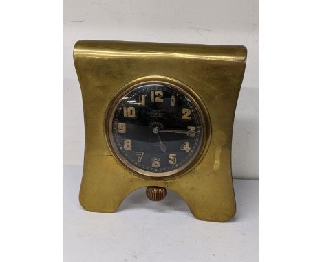 An early 20th century Asprey 8-day bedside clock fitted in a brass case Location: 