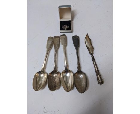 Silver to include four dessert spoons, a butter knife (loaded handle) and a ring total weight 180gLocation: 