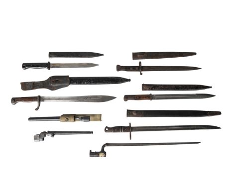 A group of Eight bayonets, comprising: a World war 1 Imperial  German Mauser 98/05 butcher bayonet, dated 1918, in leather fr