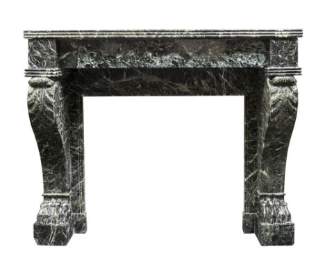 A green Verde Fleurin marble fireplace, in the Louis XVI manner, the shelf with moulded edge, on acanthus leaf carved jambs t