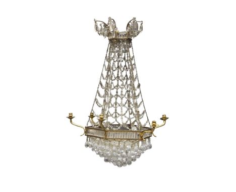 A glass and gilt metal six branch chandelier, 20th Century, the hexagonal frame filled with glass plaques to frieze  emitting