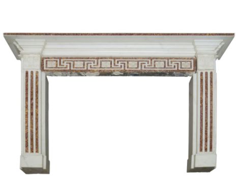 A George III style white and  Spanish Broccatelle marble chimneypiece, with rectangular shelf above a frieze applied with flo