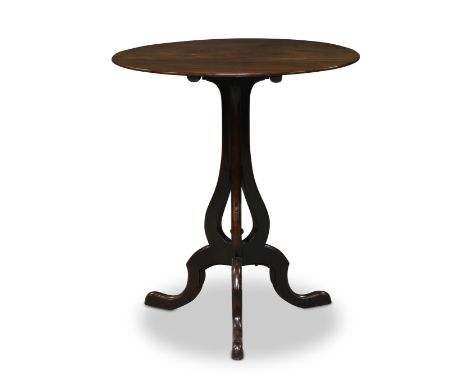 A George III mahogany tilt top occasional table, the circular top on open curving support with turned finial to tripod legs, 