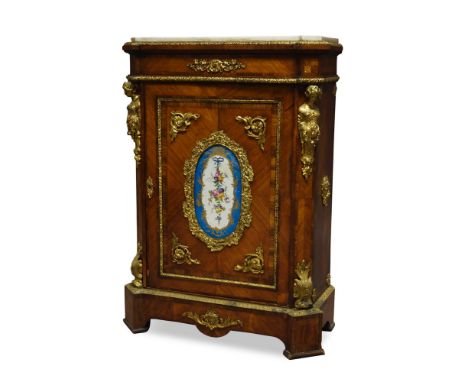 A French kingwood and gilt metal mounted cabinet, 19th century, the rectangular white marble top above cupboard door inset wi