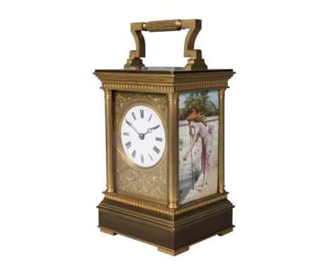 A French brass repeating carriage clock, 19th century, the gilt brass case with dentil moulded top, with Doric columns on ste