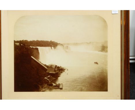 Two views of the Niagra Falls, 19th century, albumen prints, one bearing blind stamp for J Zybach Niagra Falls , mounted in m