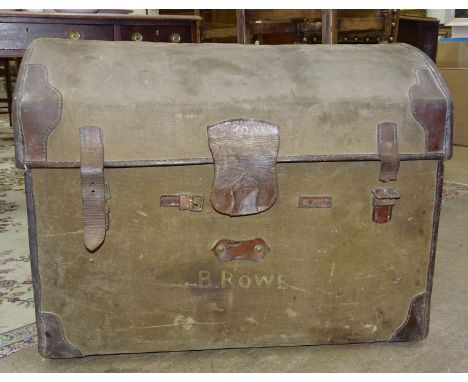 A 19th century canvas-covered and leather-bound dome-top wicker work trunk (no interior tray), bears maker's label W H Smith,