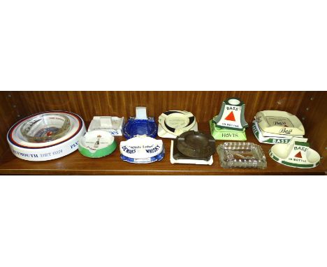 A Shelley 'The White Horse Cellar, Good Luck' advertising horseshoe-shaped ashtray/matchbox holder, 11.5 x 10.5cm, (a/f, chip