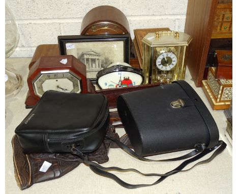 A wooden case striking mantel clock, 22cm high, 54cm wide, three other clocks, a pair of Photax 10x50 binoculars, a pair of T