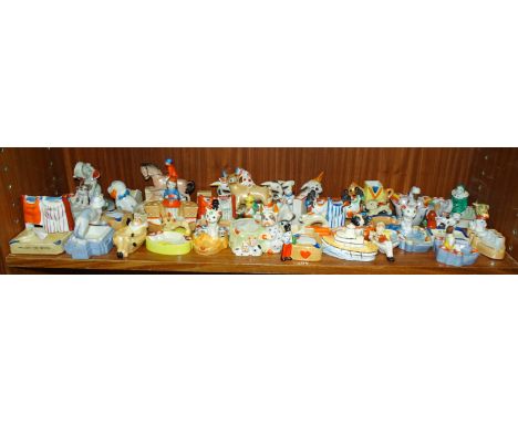 A collection of approximately thirty "Made in Japan" ceramic novelty ashtrays. 