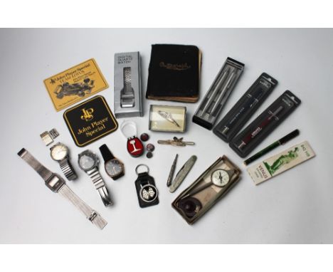 Parker pens, Workington Steelworks penknife, wristwatches, measuring gauge, autograph book etc  This bladed lot is not for sa
