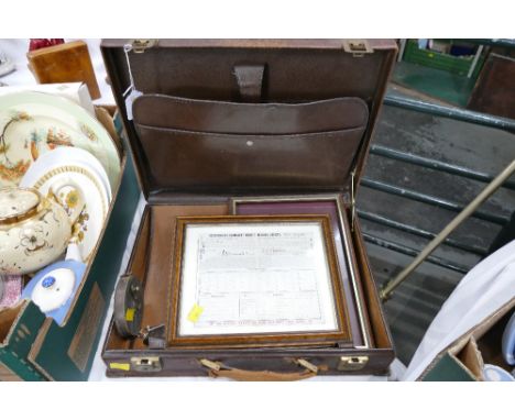 Vintage leather suitcase containing antique tape measure, Cockermouth Building Society Share Certificate dated 1910