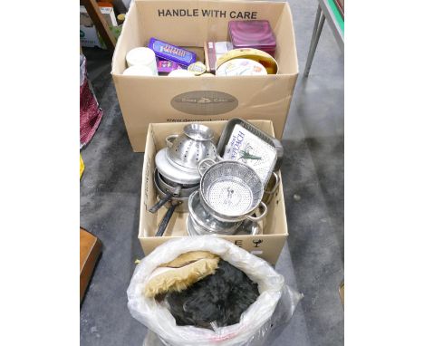 Two boxes of vintage storage and biscuit tins, saucepans, cookware, etc. and bag of fabric 