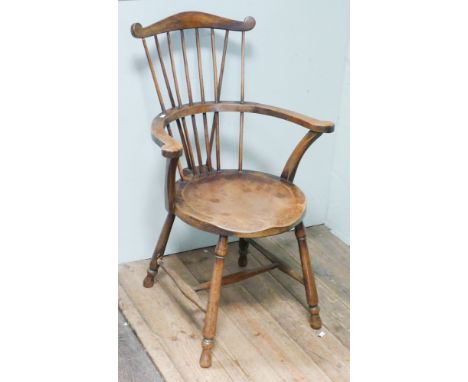 Round seat stick back Windsor elbow chair