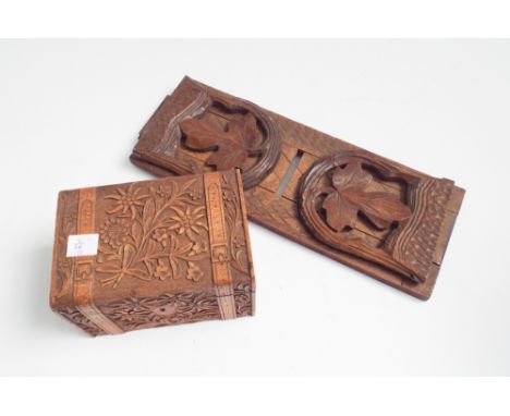 Carved hardwood trinket box and a similar carved bookslide 