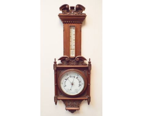 Late Victorian barometer in carved walnut case 