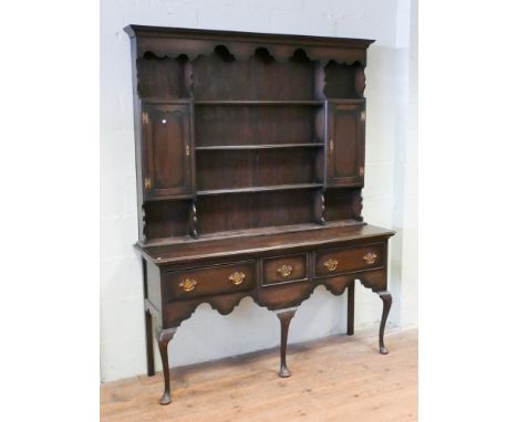 5' antique style oak dresser with plate shelf back, 3 drawers under standing on cabriole style legs 