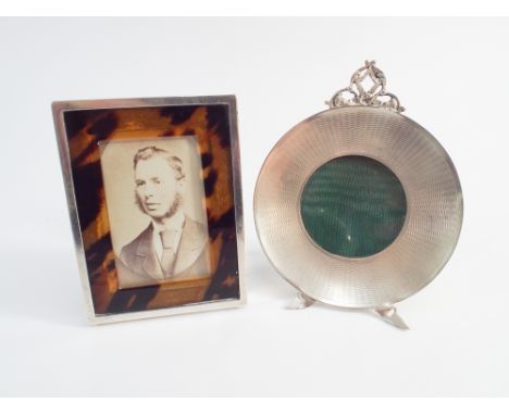 Hallmarked silver and faux tortoiseshell rectangular photo frame and hallmarked silver frame with engine turned detail.  Circ