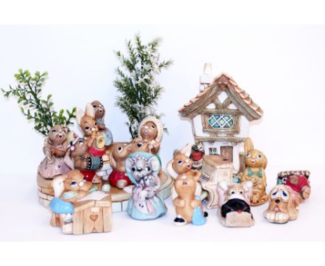 A COLLECTION OF VINTAGE PENDELFIN RABBIT FIGURE GROUPS, a tiered stand, cobble cottage etc (a quantity)