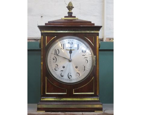 GOOD QUALITY BRASS BANDED MAHOGANY AND GILDED BRACKET CLOCK WITH SILVER COLOURED CIRCULAR DIAL IN THE REGENCY MANNER