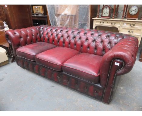 OX BLOOD RED UPHOLSTERED LEATHER THREE SEATER SETTEE 