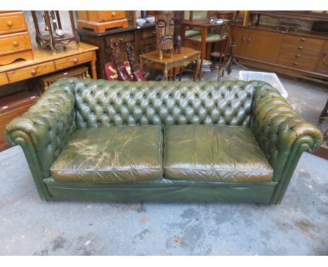 GREEN COLOURED UPHOLSTERED TWO SEATER SETTEE 