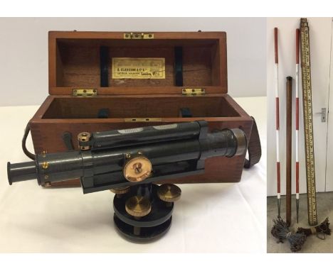  With vintage surveying equipment comprising, extending height measure, 2 poles, tripod, 2 chain link furlong measures and 2 