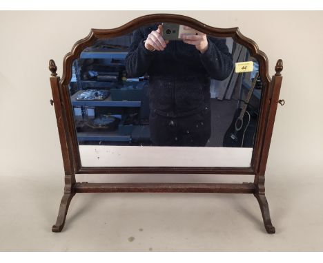 An early 20th Century mahogany framed dressing table swing mirror, 55cm wide