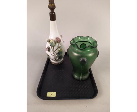 An Art Nouveau green glass vase (as found) plus a late 19th Century French porcelain lamp base with applied floral spays (som